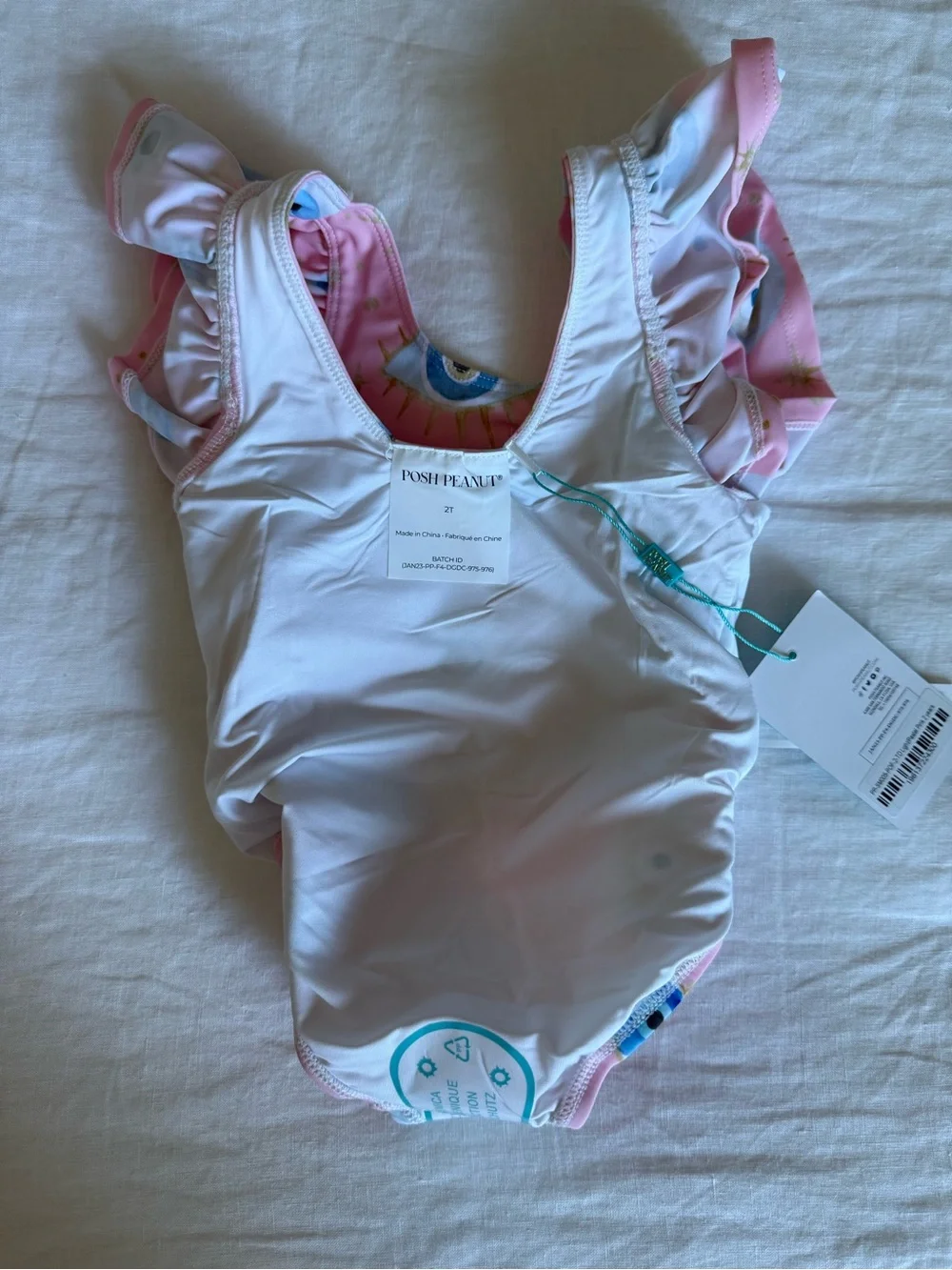Posh Peanut Pink Evil Eye Ruffle One-Piece Swimsuit | 2T